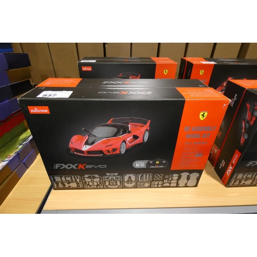 857 - 2 x Rastar radio controlled cars - Ferrari FXXK EVO. Boxed and requires assembly