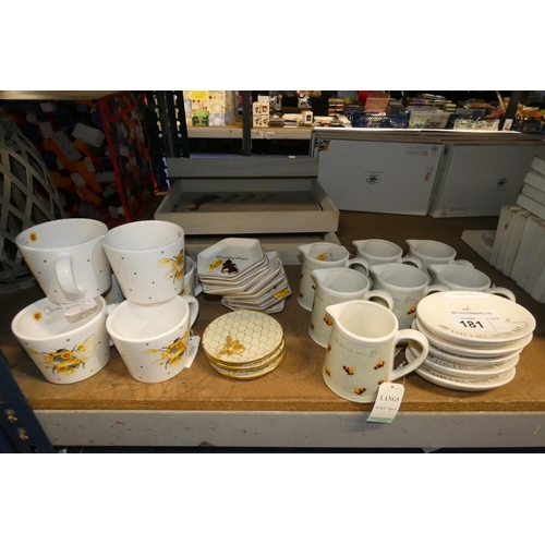 181 - A quantity of various Bee themed ceramic mugs, jugs etc