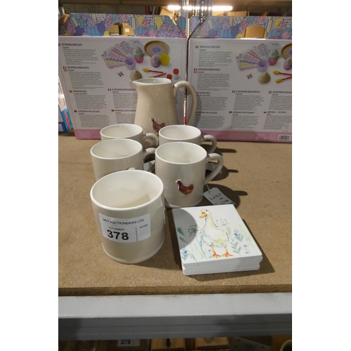 378 - 5 x mugs and a milk jug by Langs with 4 other placemats