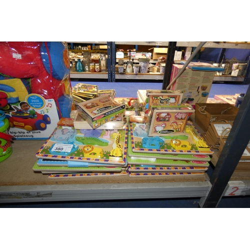 380 - A quantity of various chunky wooden puzzles Contents of 1 shelf