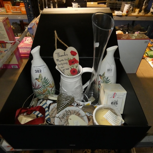 382 - 1 x black gift box containing a quantity of various items including 2 vases, a jug, candles, ornamen... 