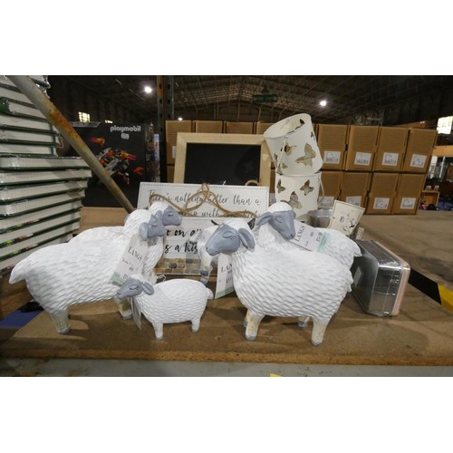 346B - A quantity of gift items to include sheep figures and tealight holders etc