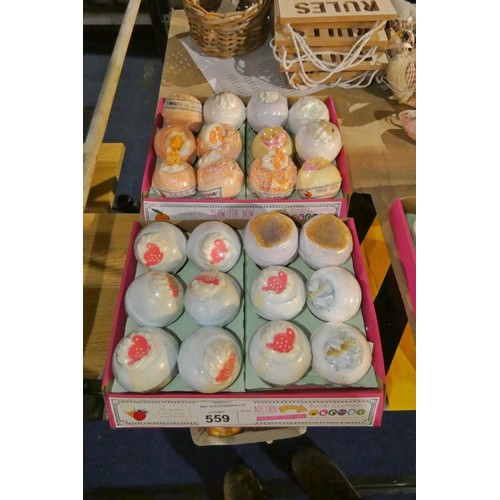 559 - 2 x cardboard trays containing a quantity of bath bombs