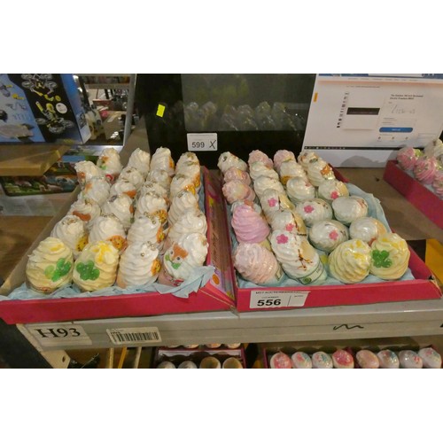 556 - 2 x cardboard trays containing a quantity of bath bombs