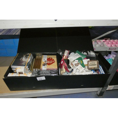 534 - 2 boxes containing a quantity of various Harry Potter gift items including note books, pencil sets e... 