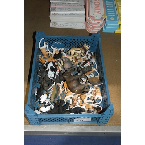 417 - A small crate containing a quantity of various Schleich animal figures