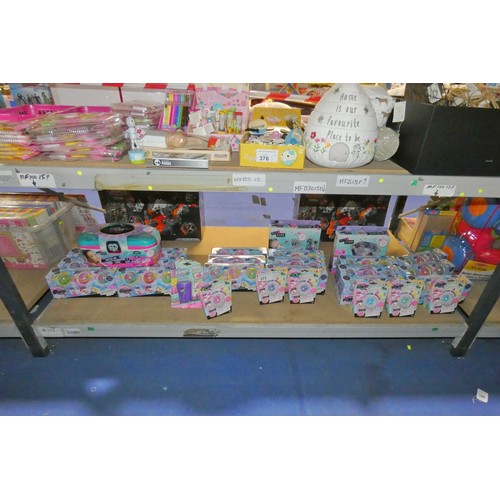 377 - A quantity of various items including glitter art kits, DIY bath bomb kits etc. Contents of 1 shelf