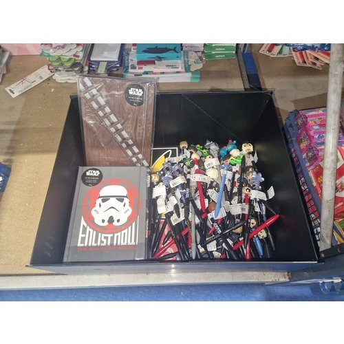 335A - A quantity of note pads and Funko pop pen toppers