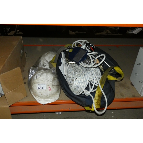 5218 - 1 bag containing climbing rope, pulleys etc and 2 x plastic helmets