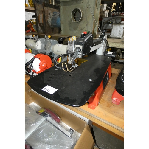 5313 - 1 x bench top scroll saw 240v. This is a sample machine with no make or model visible (ELT009325)