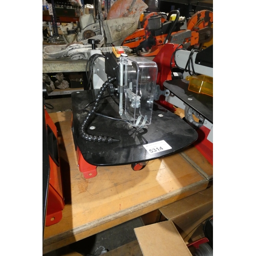 5314 - 1 x bench top scroll saw 240v. This is a sample machine with no make or model visible (ELT009322)