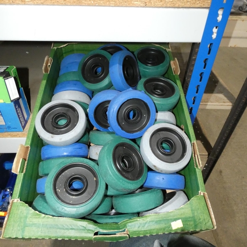 5575 - 1 box containing a quantity of various caster wheel rims (no centres)