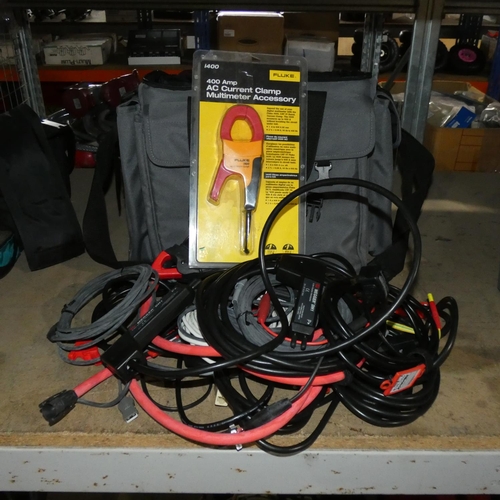 5589 - A grey carry bag containing a quantity of various electrical test items and leads including Megger D... 