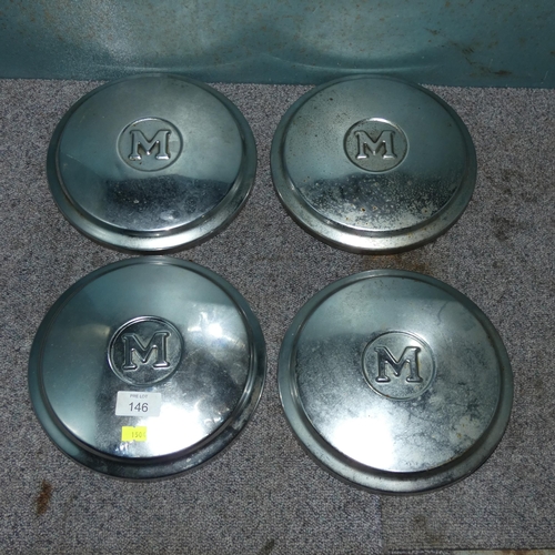 146 - 4 x Morris hubcaps