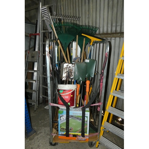 5747 - A quantity of various hand tools including spades, rakes etc. Contents of 1 wheeled cage which is no... 