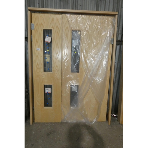 5753 - A two part office interior door (fire door?) each of the two doors has 2 x panes of glass fitted and... 