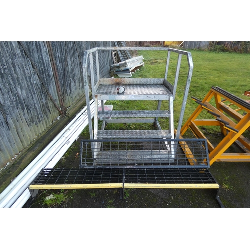 6001 - A wheeled set of metal steps measuring approx 112 w x 125cm d x 145cm h and 2 various low level meta... 