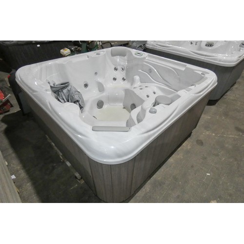 An Artesian SS 735L Dx ex-display hot tub with black insulated cover ...