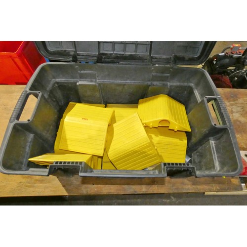 5919 - 1 x black plastic box containing a quantity of Pyramid yellow plastic cable / hose protectors