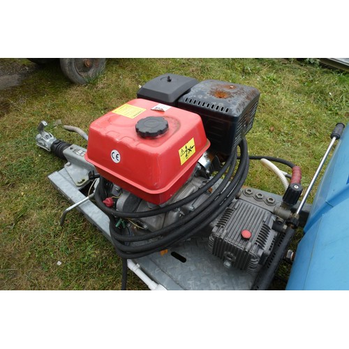 5997 - A blue plastic tow behind water bowser on a braked single axle trailer, capacity approx 1100L, has a... 