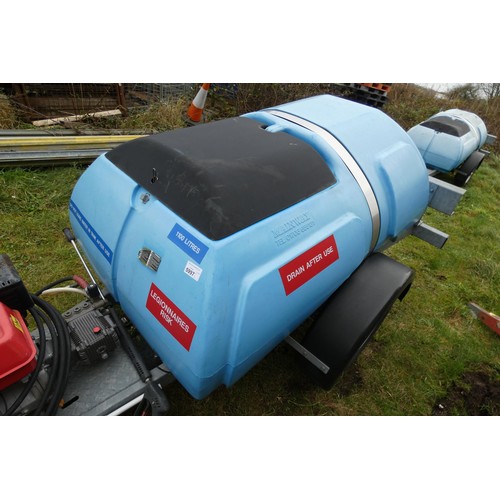 5997 - A blue plastic tow behind water bowser on a braked single axle trailer, capacity approx 1100L, has a... 