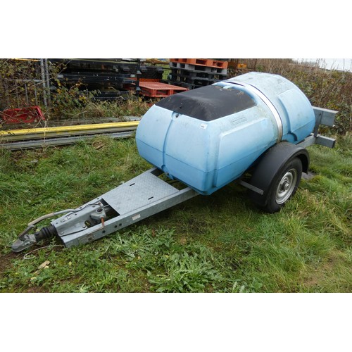 5998 - A blue plastic tow behind water bowser on a braked single axle trailer, capacity approx 1100L