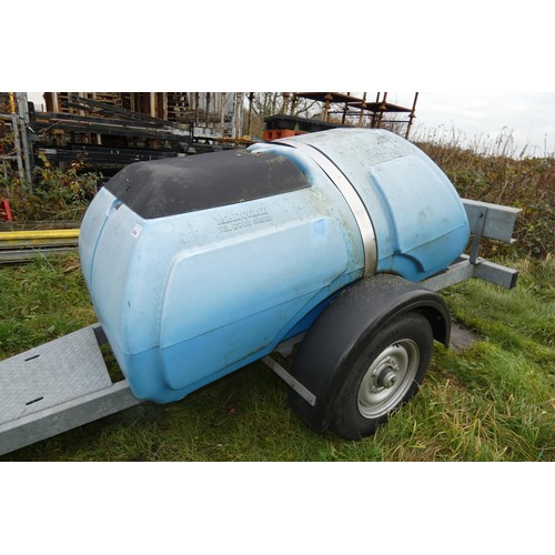 5998 - A blue plastic tow behind water bowser on a braked single axle trailer, capacity approx 1100L