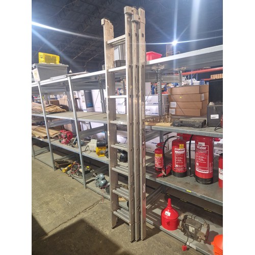 5888 - A Youngman triple extending aluminium ladder (3 x 8 rung)