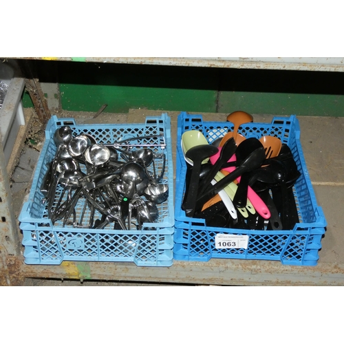 1063 - 2 crates containing a quantity of various kitchen utensils inc stainless steel ice-cream scoops, cra... 