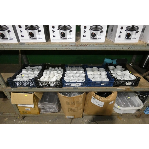 1071 - 5 x small crates containing a quantity of white crockery including milk jugs, salt & pepper pots, su... 