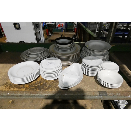 1077 - A quantity of various white crockery including plates, bowls, etc, contents of 1/2 a shelf