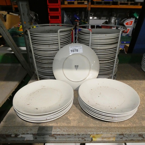 1078 - A quantity of over 60 various dinner plates mostly IKEA & 2 plate racks