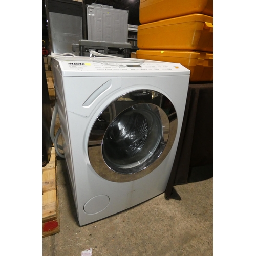 1127 - LOT WITHDRAWN: An under counter washing machine by Miele type W-4446 - trade