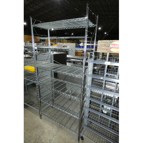 1151 - A tall catering type rack with 6 adjustable shelves approx 107x48x224