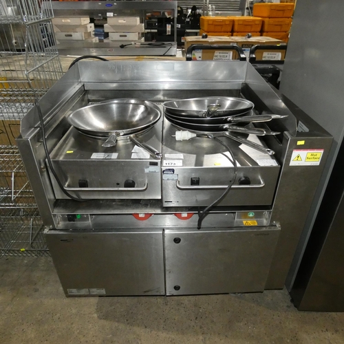 1173 - A commercial stainless steel catering wok station comprising of 2 wok induction hobs and a surround ... 