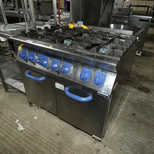 1188 - A commercial stainless steel gas fired 6 burner range with double door oven beneath by Electrolux  -... 