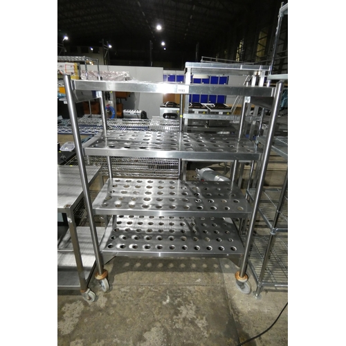 1193 - A commercial stainless steel mobile catering type rack with 4 draining shelves approx 120x60x164cm