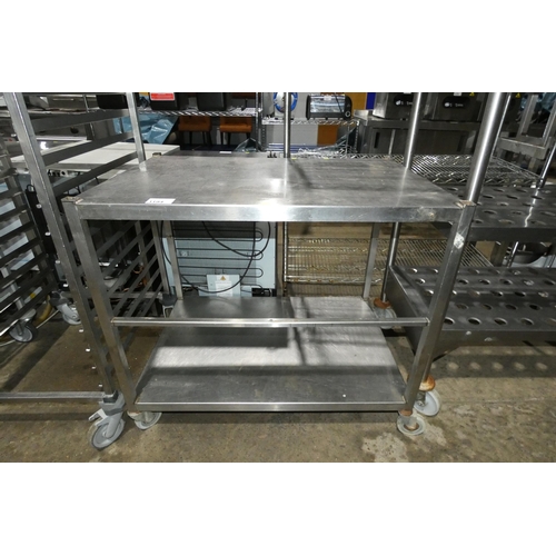 1194 - A commercial stainless steel mobile prep table with shelf beneath approx 101x70x90cm