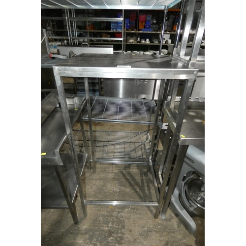 1221 - A tall commercial stainless steel catering type table approx 67x54x130cm, with open space beneath