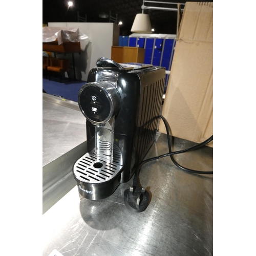 1233 - A small coffee pod coffee machine by Rowlett (Nespresso) - trade