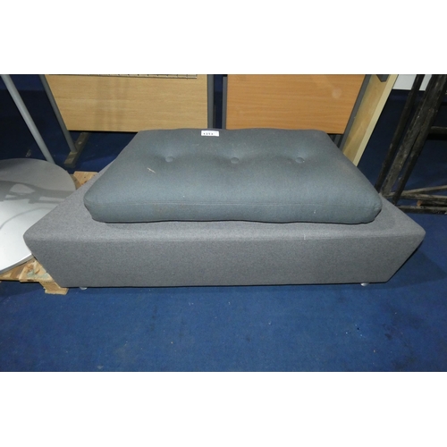 1313 - A grey upholstered trapezium shaped reception seat approx 147cm on longest side x 66cm and 1 x non-m... 