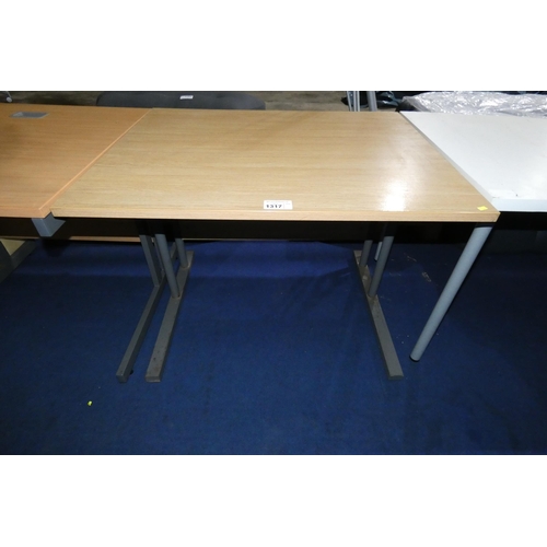 1317 - A metal framed office table with a wood effect top measuring approx 100cm x 80cm