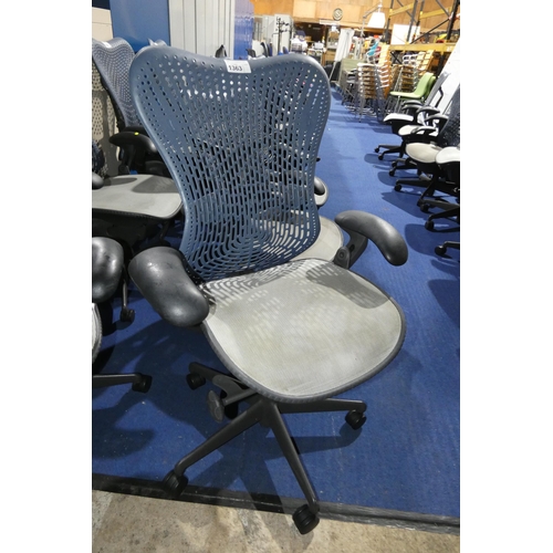 1363 - 1 x Herman Miller Mirra office swivel chair with grey mesh seat and dark blue plastic back