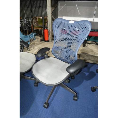 1367 - 1 x Herman Miller Mirra office swivel chair with grey mesh seat and dark blue plastic back