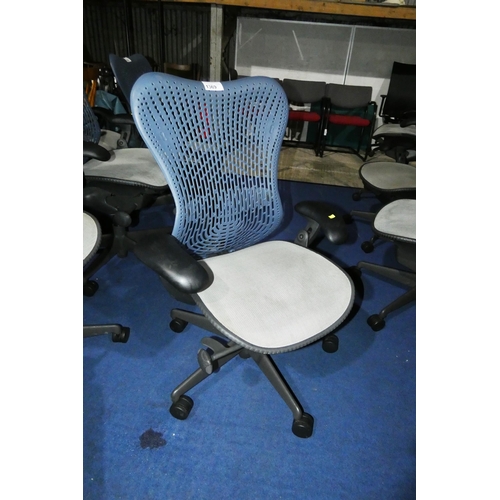 1369 - 1 x Herman Miller Mirra office swivel chair with grey mesh seat and dark blue plastic back