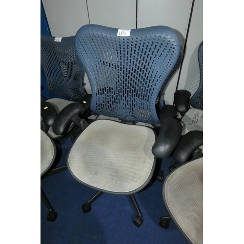 1373 - 2 x Herman Miller Mirra office swivel chairs with grey mesh seat and dark blue plastic back. Please ... 