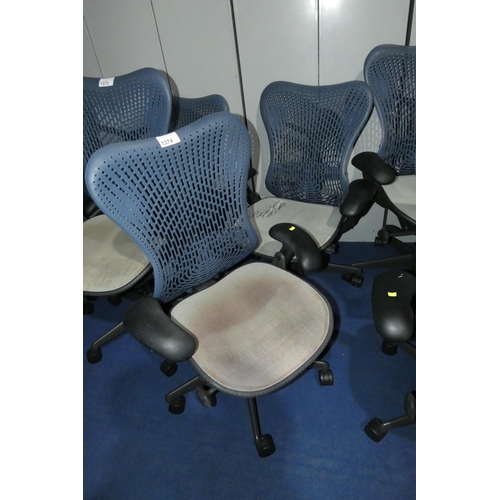 1374 - 2 x Herman Miller Mirra office swivel chairs with grey mesh seat and dark blue plastic back. Please ... 