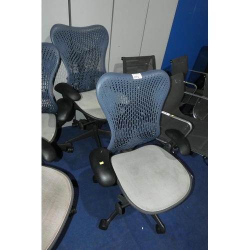 1375 - 2 x Herman Miller Mirra office swivel chairs with grey mesh seat and dark blue plastic back. Please ... 