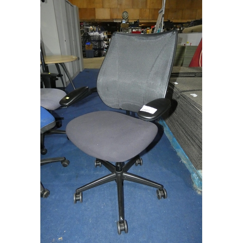 1407 - 1 x black upholstered office swivel chair with mesh back panel