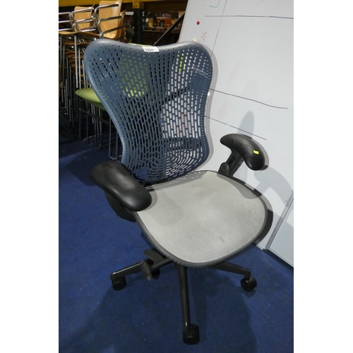 1420 - 1 x Herman Miller Mirra office swivel chair with grey mesh seat and dark blue plastic back